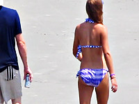 This is the beach bikini video that was made when the real cutie was walking along the beach together with her boyfriend