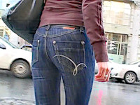 Oh, what a gorgeous body! I bet she's a model! Her beautiful butt in denim hot pants totally drove me crazy and made my heart beat faster.