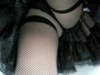 Mmm, guys, keep your hands away from this babe because she is my wife. All you can do is just watch this upskirt movie with the enticing closeups of the long legs wrapped in fishnets and black panty upskirt